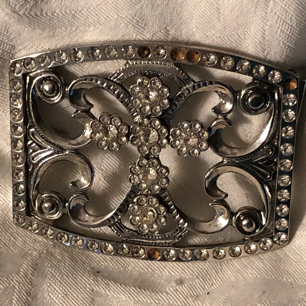 Large silver buckle with cross